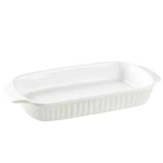 a white rectangular casserole dish with ribbed design on the bottom and sides