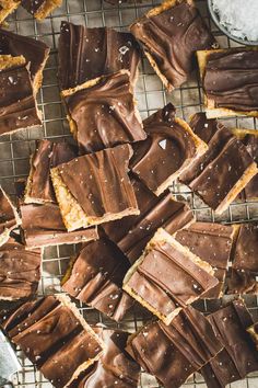 chocolate and peanut butter bars on a cooling rack