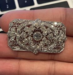 Art Deco Platinum Round European Cut Diamond Pin1 1/2 inches Long 7/8th inches wide  11.6 Grams This is a timeless Art Deco pin. This pin is in great condition!! The diamonds are all heavy, chunky cut stones that are just perfection. The photos do not do this pin justice. If you have any questions or concerns please message me and I will get back to you as soon as possible. AJ1081425 C Timeless Art, European Cut Diamonds, Favorite Jewelry, Vintage Antiques, Ebay Finds, Brooches, Diamond Cuts, Platinum, Art Deco