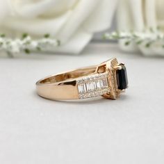 This beautiful ring is made from genuine 925 sterling silver with Rose Gold plating. Ring details- -The Main stone is an Emerald Cut 7mm by 5mm Natural Black Onyx Stone -Side stones are Round 1.1mm And 1.2mm simulated diamonds And 3mm by 1.5mm Baguette Simulated Diamonds -Ring is casted in solid 925 sterling silver with Rose Gold plating ( yellow gold and white rhodium plated also available, please check the drop down menu for more options) -The Total face height of the ring measures 11mms and t Classic Black Baguette Cut Rings, Elegant Black Baguette Cut Ring, Black Baguette Cut Ring For Formal Occasions, Formal Black Baguette Cut Rings, Garnet Wedding Rings, Wedding Rings Round, Simulated Diamond Rings, Etsy Wedding Rings, Black Onyx Stone