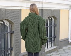 "MATERIAL : 2 strands of 100 % soft wool COLOUR : Green ( There may be a slight difference because of the different monitors' representation) ♥ In the picture the model is wearing a garment with these measurements : A: ( Body lenght) : 28.3 \" / 72 cm B: ( Chest width) : 21.3 \" / 54 cm C: (Sleeve from under the arm) : 22.8 \" / 58 cm D: (Neck unrolled) : 3.5 \" / 9 cm. They are taken with the item laid flat and not streched. ♥ For choosing your size please look at size chart in our listing pict Cozy Merino Wool V-neck Sweater For Winter, Green Merino Wool Long Sleeve Outerwear, Green Long Sleeve Merino Wool Outerwear, Cozy Wool V-neck Winter Sweater, Cozy Wool V-neck Sweater For Winter, Long Sleeve Merino Wool Cable Knit Sweater Coat, Wool Chunky Knit V-neck Cardigan, Wool V-neck Long Sleeve Sweater For Winter, Wool V-neck Chunky Knit Sweater