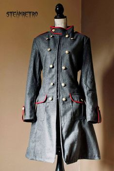 ladies grey/red wool trench coat Gothic Steampunk Military coat. Grey wool with red PU leather style piping(animal friendly!) Brass button up front military style pannel which is entirely removable. Interior full length zipper. Military style epaulettes on shoulder and cuffs. Polyester lining. 2 front pockets. Collar fastening. Stand out form the crowd with our unique military style ladies coat, ideal for spring/autumn fashion and festival wear. perfect for Gothic, Darkwave or Steampunk enthusia Modern Steampunk Fashion, Winter Steampunk, Cat Died, Womens Trench Coat, Oc Clothes, Steampunk Coat, Military Jacket Women, Gothic Coat, Disco Elysium