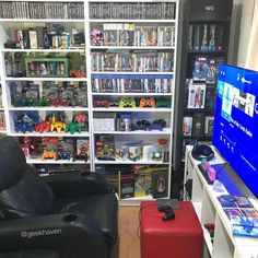 a living room filled with furniture and a flat screen tv