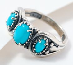 Thrice as nice as a solitaire style, this three-stone gemstone ring adds gorgeous color to any outfit. Add From American West Jewelry. Turquoise Ring With Accent Stones For Promise, Three Stone Oval Cabochon Rings For Anniversary, Oval Turquoise Ring For Anniversary, Oval Turquoise Anniversary Ring, American West, Three Stone, Gemstone Ring, Band Ring, Prong Setting