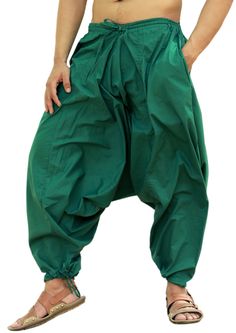 "S P E C I A L O F F E R : GET FLAT 10% DISCOUNT When you Buy 1 Item GET FLAT 15% DISCOUNT When you Buy 2+ Items These Harem Pants made from 100% Cotton Fabric with Elastic and Drawstring fitted waistband. These Pants has Drawstring fitted ankles also. Perfect for casual wear, festivals, yoga, holidays as well as pairing with a plain top to get that popular look. S I Z E & D E T A I L S : ✿ Material: 100% Cotton ✿ FREE SIZE FITS TO ALL (up to 46 Inches Waist) ✿ Imported, Made in India. ✿ Len Unisex Pants, Boho Pants, Plain Tops, Baggy Pant, Casual Trousers, Beach Wear, Men Boys, Yoga Pants, Free Size