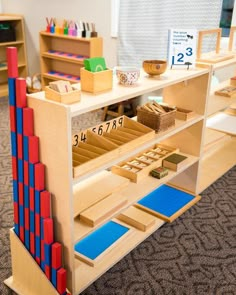 a child's play area with toys and bookshelves