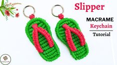 a pair of green and red slipper keychains sitting on top of a white table