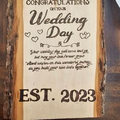 a wooden sign that says congratulations on your wedding day