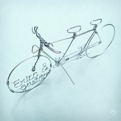 a bicycle made out of wire and glasses on a white background with the words enjoy every moment written in it