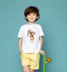 Cute Giraffe T-shirt for Kids Crafted with love and care, this tee is made from 100% combed ringspun cotton to ensure comfort and durability with soft feel. The vivid and detailed graphic is printed with eco-friendly, water-based inks that are gentle on both your skin and the environment. All shirts are printed specially for order, with our turn around being 2-3 business days from ordering to dispatch. Playful Funny Print Short Sleeve T-shirt, Playful Short Sleeve T-shirt With Funny Print, Playful Cotton T-shirt With Sublimation Print, Playful Pre-shrunk Short Sleeve T-shirt, Playful Short Sleeve Pre-shrunk T-shirt, Playful Cotton T-shirt, Playful Summer T-shirt With Character Print, Playful T-shirt With Sublimation Print For Summer, Playful White Shirt With Cartoon Print