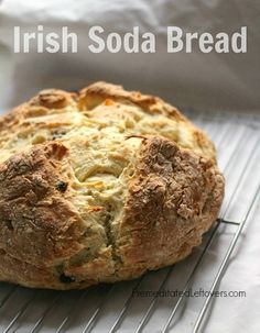 an irish soda bread sitting on top of a cooling rack