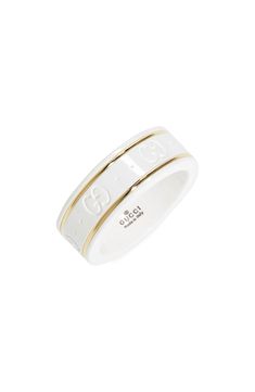 The emblematic double-G motif is embossed in this opulent white zirconia ring that's enriched by 18-karat gold trim for a subtle contrast. Style Name:Gucci Icon White Zirconia & 18K Gold Ring. Style Number: 6134008. Available in stores.