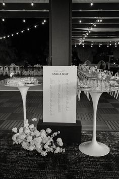 there is a table and chairs set up for an event