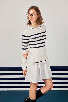 Elevate your wardrobe with our Stripe Mix Media Dress. Combining two striking fabrics this dress is a true showstopper. The classic stripe pattern stands out against the mix media design adding a touch of modern flair. The round neckline and long sleeves with contrast flared cuffs add a chic touch to this must-have dress. Perfect for any occasion our dress will effortlessly take you from day to night. Available in a range of sizes this dress will flatter your figure. Shop now and stand out in style! Mix media Stripe Round neckline Long sleeves with contrast flared cuffs Bottom contrast flared shirt skirt Fitted bodice Pull over Mini length Hand wash cold Do not bleach Iron low Do not tumble dry Exclusive of Elastic Shell: 52% Rayon 48% Nylon Contrast: 100% Cotton SS492D Total length: 34.5" Flared Shirt, Flare Shirt, Mixed Media Dress, Mixed Media Design, Summer Style Guide, Casual Party Dresses, Maxi Dress Sale, Skirt Fits, Fashion Night