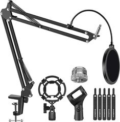 an image of a microphone set up on a white background with accessories for the recording