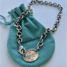 Vintage “Please Return to Tiffany & Co.” choker. 15” total length. Perfect condition but could use a detailed polishing. Only worn a handful of times then kept in its original Tiffany’s bag. This necklace is retired from Tiffany & Co. now. I think my original purchase date was around 1998 or 99. Last picture of 925 stamp on clasp shows authenticity. Return To Tiffany, Fine Jewellery Necklace, Tag Necklace, Tiffany & Co., Cute Jewelry, Jewelry Necklace Pendant, Choker, Fine Jewelry, Jewelry Necklaces