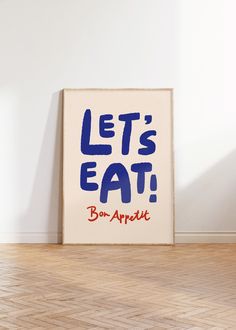 a sign that says let's eat bor appetit on the floor