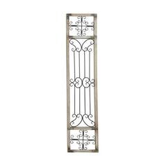 an iron window with scroll designs on the top and bottom bars, set against a white background