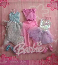 the barbie doll is in its box and has three different outfits on it's back