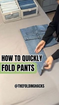 a person laying on top of a bed next to some folded up jeans with the words how to quickly fold pants