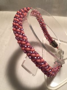 Bracelet is made with pink seed beads and a silver  magnet closer. Tacoma Wa, Wrap Bracelet, Seed Beads, Magnets, Seeds, Jewelry Bracelets, Beaded Bracelets, Bracelet, Beads