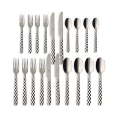 a set of eight forks and spoons with black and white checkered handles