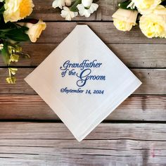 The handkerchief will read Grandfather of the Groom and the wedding date. The digitized example lettering is shown in medium grey.  The handkerchief is a traditional men's white handkerchief with a satin band and a hand rolled hem, measuring 16" by 16". The product is made in a smoke free home. White Wedding Handkerchiefs With Custom Embroidery, White Handkerchiefs With Custom Embroidery For Wedding, Customizable White Handkerchiefs For Anniversary, Classic Wedding Handkerchiefs For Father's Day, Custom Text White Handkerchiefs For Wedding, White Custom Text Handkerchiefs For Wedding, White Handkerchiefs With Custom Text For Wedding, White Embroidered Text Handkerchief Wedding Gift, Wedding Hankerchief