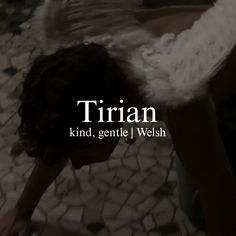 an image of a woman with angel wings on her head and the words trian kind, geniel / welsh