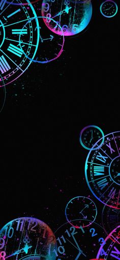 an image of many different clocks in the night sky with colored lights on them and black background