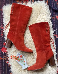 "Vintage style suede boots by Coach. Soft, rich rust colored suede. Slips on, stacked heels, great back lacing detail and white stitching. These are in great condition with minimal signs of wear. Marked a size 5 Insole 8 1/8\" Width 3.5\" Heel 3\" 14\" tall Calf opening 13\"" White Gogo Boots, Spectator Shoes, Granny Boots, Brown Leather Riding Boots, Victorian Valentines, Coach Boots, Equestrian Boots, Velvet Boots, Gogo Boots