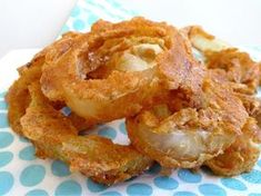 some fried food on a blue and white napkin