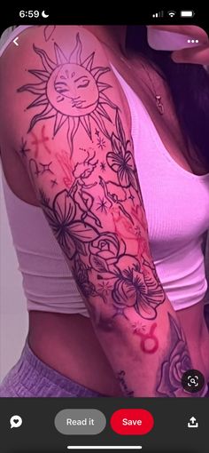 a woman's arm with flowers and sun tattoo on the left side of her arm