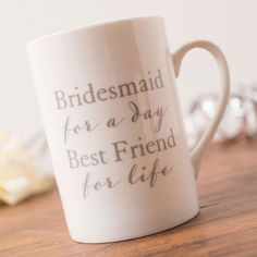 a coffee mug that says, bridesmaid for a day best friend for life