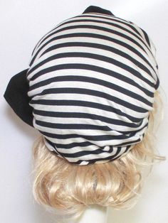 "Borderline Style Slouchy Turban- Black & White Striped Knit with Single Knit Black Bow a 1\" elastic soft band inside. One size fits all and will fit up to a 23\" head size or customized size upon request. All of Bella Starr hats are made and designed from my original patterns. Caring for your hat: Hand wash and hand dry That Girl Beret can be folded for travel and all you need to do is steam or press to look good as new. A glamorous, hand-made, stylish hat, that complements your choice in Fitted Beanie Bonnet For Spring, Black Beanie Turban One Size, Fitted Black Turban For Summer, Fitted Black Summer Turban, Beret Hat Bow, Knit Turban, Turban Hat, Stylish Hats, Beret Hat