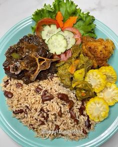 a blue plate topped with rice, beans and veggies