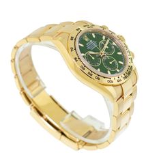 Description Guaranteed Authentic Rolex Daytona with a 40mm 18K yellow gold case and a "John Mayer" Green Index dial with three green subdials. This fine timepiece is waterproof up to 100 meters. It features a chronograph central seconds hand, a 30-minute counter, a 12-hour counter, an 18K yellow gold tachymeter bezel, and an 18K yellow gold Oyster bracelet. This watch is unworn with tags and its box. It comes with a Five Year Warranty through Rolex (warranty starts from the original purchase dat Swiss Luxury Watches, Swiss Luxury, Oyster Bracelet, John Mayer, Rolex Daytona, Gold Case, Luxury Watches, Chronograph, Time Piece