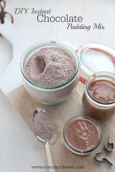 homemade chocolate pudding mix in jars with spoons