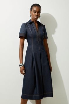 Feel Confident In Our Midi Dress, Made In Classic Denim Fabric, Featuring A Darted Waistline That Cinches The Silhouette, A Formal, Flowing Skirt, And A Shirt Style Bodice. Style It With Court Heels Or Ankle Boots For A Look Perfect For Office Days, Then Wear It With Heeled Boots Or Stilettos For An Evening Look. Tailored Denim Full Skirted Midaxi Shirt Dress High Quality Denim Fabric Flattering Fit And Flare Silhouette Formal Collar Accent Cinched, Darted Waist Zip Front Fastening Short Sleeves Hen Do Outfits, Workwear Capsule Wardrobe, Petite Midi Dress, Outfits For Mexico, Spring Wedding Guest Dress, Petite Business Casual, Ibiza Outfits, Court Heels, Full Skirt Dress