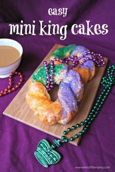 an easy mini king cake with mardi gras beads and a cup of coffee