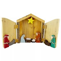 a nativity scene with three wise men and a star in the mangeroom