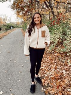 Stay cozy and warm in this sherpa jacket, perfect for any outdoor activity. Made of faux shearling and nylon, this hooded zip jacket features a left breast zip pocket and tan accents. With its soft and fuzzy texture, this sherpa jacket is a must-have for your winter wardrobe. Whether you're running errands or exploring the outdoors, this jacket will keep you comfortable and stylish. Don't let the cold weather stop you, grab this women's sherpa jacket today! Model is 5'9 wearing a large (true to Womens Sherpa Jacket, Sherpa Jacket, Winter Wardrobe, Running Errands, Varsity Jacket, Zip Pockets, Black Jeans, Wardrobe, Dresses