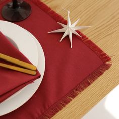 a red table cloth with two white stars on it