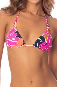 A triangle silhouette defines this tropical bikini top with a surprise print on the reverse. Pattern on reverse side may vary Ties at neck and back Lined, with removable soft cups 52% recycle polyamide, 30% polyamide, 18% spandex Hand wash, dry flat Imported Hispanic & Latinx Owned/Founded Pink Triangle Swimwear, Multicolor Triangle Swimwear For Sunbathing, Tropical Triangle Swimwear For Poolside, Tropical Triangle Swimwear For Sunbathing, Tropical Bikinis, Hairstyling Products, Cute Bathing Suits, Soft Cup, Rollerball Perfume