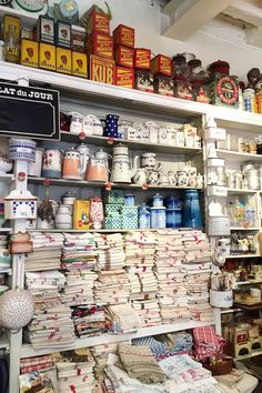 the shelves are filled with many different types of items and things to buy from them