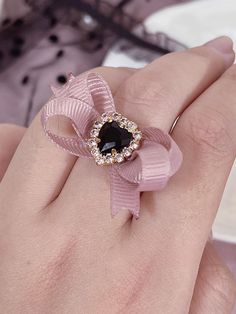 The price is for a ring only, others are not included. Elegant Heart-shaped Rings For Party, Elegant Heart Shaped Rings For Parties, Pink Ribbon Jewelry For Party, Pink Open Crystal Ring For Parties, Pink Crystal Open Ring For Party, Black Bow Jewelry Gift, Black Bow Jewelry For Gifts, Elegant Black Heart Ring For Weddings, Black Bow Jewelry For Gift