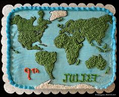 a cake decorated with the map of the world