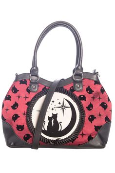 Join the lunar sisters, sitting on a crescent moon. This witchy handbag pairs a cat head print with a beautiful twin cat appliqué. Sit in the starlight with your feline familiars, encased in ruched ribbon. Available in black or burgundy, this bowler style bag is a great addition to any gothic wardrobe. - Bowler style bag- Dual handles- Cat head print - Lunar Sisters appliqué- 80 % polyester 20% PU- 100% polyester lining- Length: 46 CM | Width: 13.5 CM | Height: 29 CM Burgundy Bag, Cat Applique, Micro Bags, Everyday Handbag, Ring Der O, Cat Bag, Women Bags Fashion, How To Make Handbags