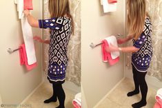 a woman is doing something in the bathroom with pink towels on her towel rack and toilet paper