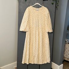 This Dress Is A New Brand And Is Great Condition, No Tag But Has Been Carefully Stored 3/4 Puff Sleeves Drawstring Waist With Tie At Back Ruffle Trim Size 40 ( Us 10 ) Retail $345 Pockets Spring Prairie Dress With Puff Sleeves For Brunch, Cream Puff Sleeve Dress For Spring Daywear, Spring Cream Puff Sleeve Dress For Daywear, Cream 3/4 Sleeve Spring Dress, Spring Midi-length Prairie Dress For Daywear, Spring Prairie Dress Midi Length For Daywear, Spring Prairie Dress With Puff Sleeves For Daywear, Spring Cream Dress With Gathered Sleeves, Flowy 3/4 Sleeve Dresses For Daywear