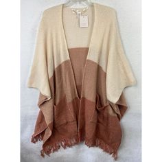 Elevate Your Winter Wardrobe With This Stunning Lauren Conrad Poncho Shawl. The Slouchy, Relaxed Fit Of This Cardigan-Style Sweater Is Perfect For Any Occasion, Whether You're Running Errands, Traveling, Or Working. The Multicolor Acrylic Material Is Lightweight, Soft, And Machine Washable For Easy Care. Featuring Tasseled And Fringe Accents, This Sweater Has A Bohemian, Hippie, And Western Theme, Making It A Versatile Addition To Any Outfit. The V-Neckline And Short Sleeves Provide A Classic To Womens Poncho, Poncho Shawl, Slouchy Sweater, Cardigan Style, Western Theme, Bohemian Hippie, Style Sweater, Cardigan Fashion, Shrug Sweater